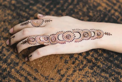 Close up of an artistic mehndi henna design on - arabic mehndi