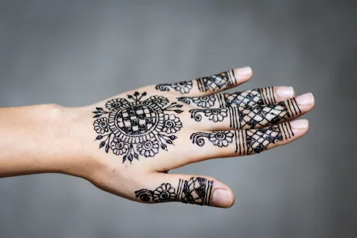 Close up of intricate henna design on a hand s - arabic mehndi
