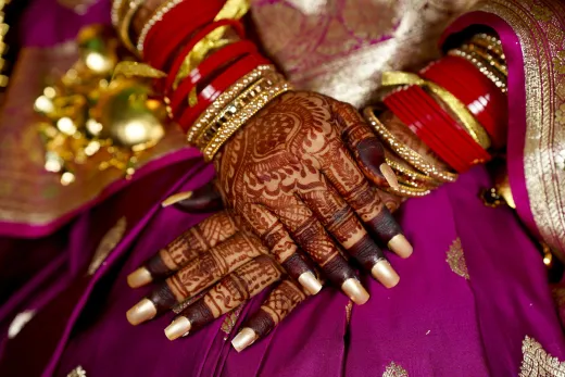 Close up of bride s henna adorned hands with t - bridal mehndi