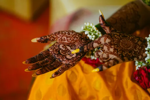 Detailed mehndi design on bride s hands with v - bridal mehndi