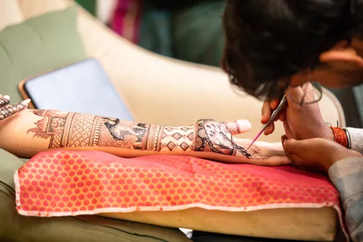 Artistic henna design application on arm with - bridal mehndi
