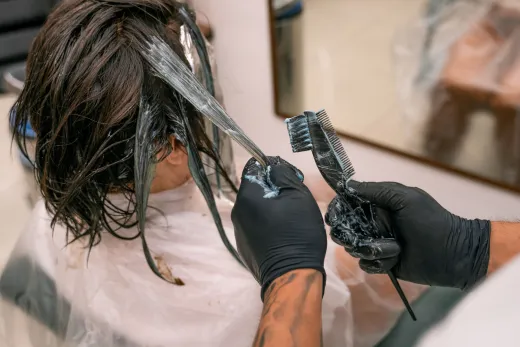 Close up of hair coloring process in a salon h - henna hair colour