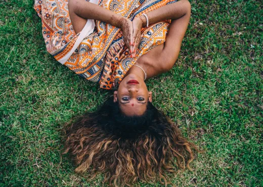 Aerial view of a woman in traditional attire l - henna hair