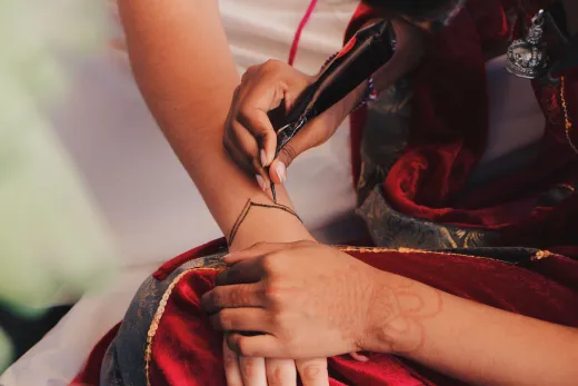 Close up of intricate henna design on a woman - henna on skin